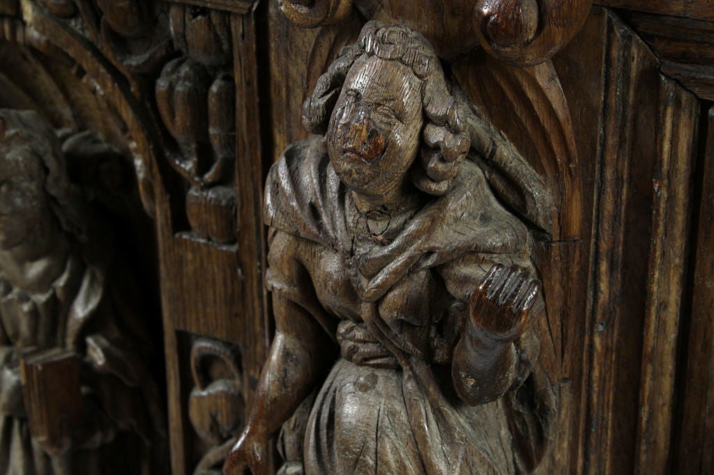 An impressive carved oak coffer comprising 17th century panels depicting the resurrection of Christ within a 19th century oak coffer.