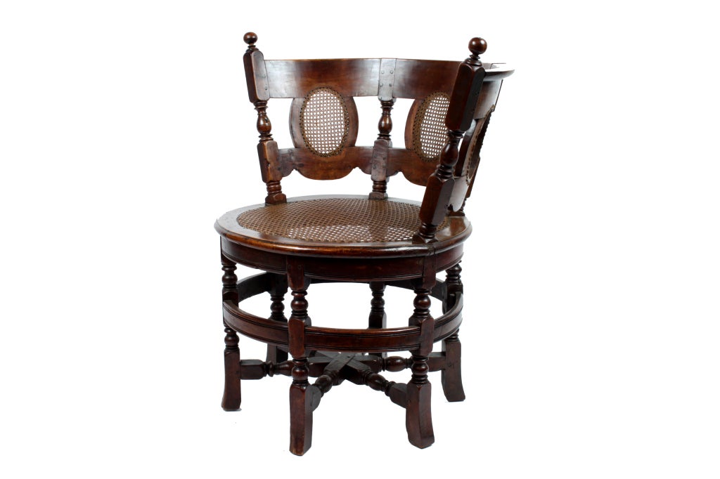 A rare barrel form character chair with beautiful patina.