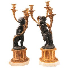 Cupid and Child Satyr Bronze and Gilt Candelabra