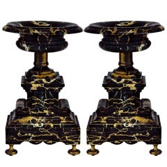 Pair of Black Marble Urns with White and Yellow Figuring