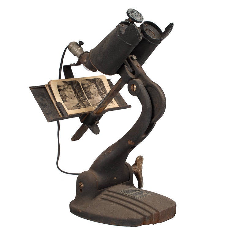 This early Keystone Ophthalmic Telebinocular is the accepted Pioneer instrument of modern binocular vision testing and training. Great as an object of interest, lighting and binoculars still function. Comes with box of slides.