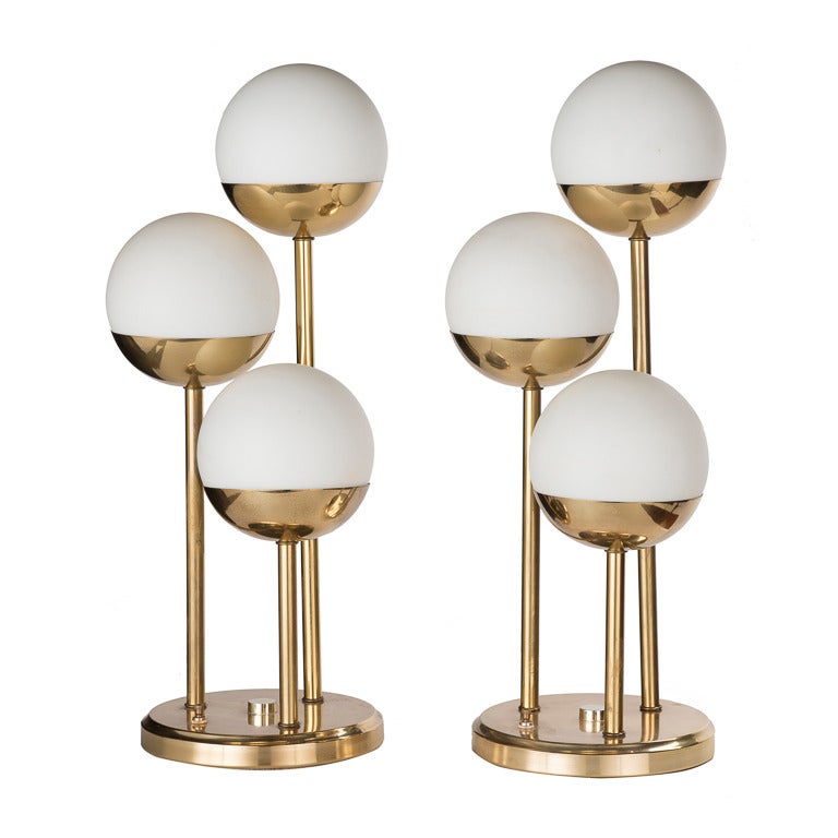 Pair of unique Mid-Century Modern Italian brass tri-globe lamps.