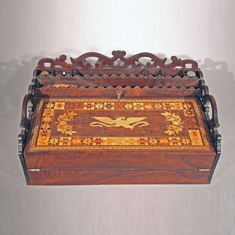 Rare Laptop Desk
Ca. 1840-1860
Having inlaid eagle surrounded by marquetry work, retains original label from Madiera.