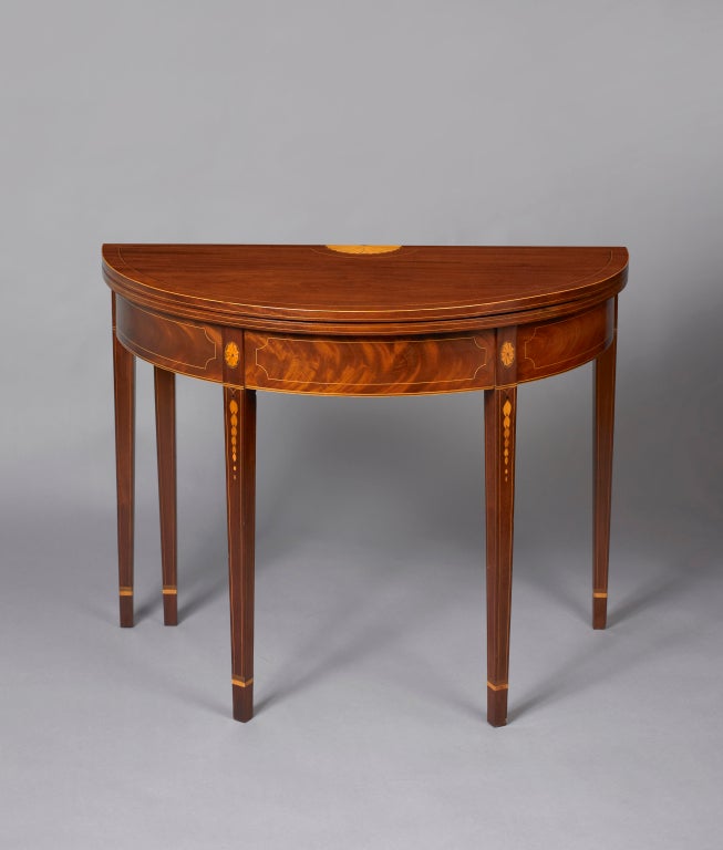 New York, circa 1795.
Provenance: Private Family, Kent, Connecticut
This table's inlay patterns are of extraordinary quality in both composition and detail. The intricacy, along with the thoughtful design, put the table at the highest level of