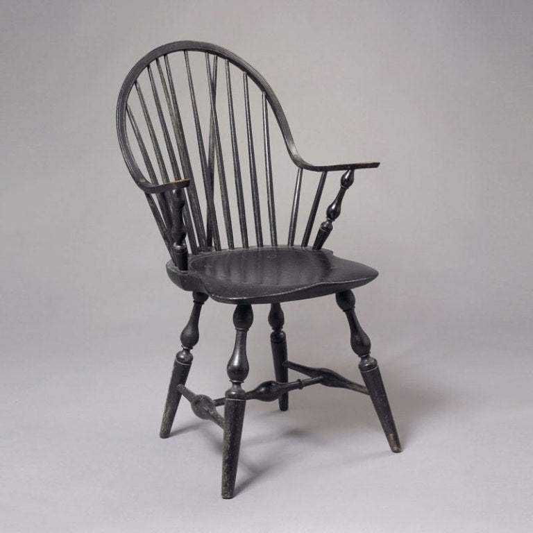 New York, circa 1785-1795. Having a hoop-back supported by spindles and a brace back with a shaped saddle seat supported by bulbous turned legs.