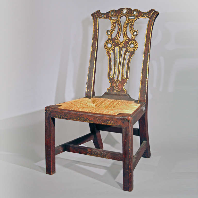 English or American, ca. 1770-1790.
Mahogany, decorated with inlaid shells, glass, and turquoise beads, gilt highlight.
Condition: In a fine state of preservation, wonderful early 19th c. surface. Old repair to the back right foot,retains an early