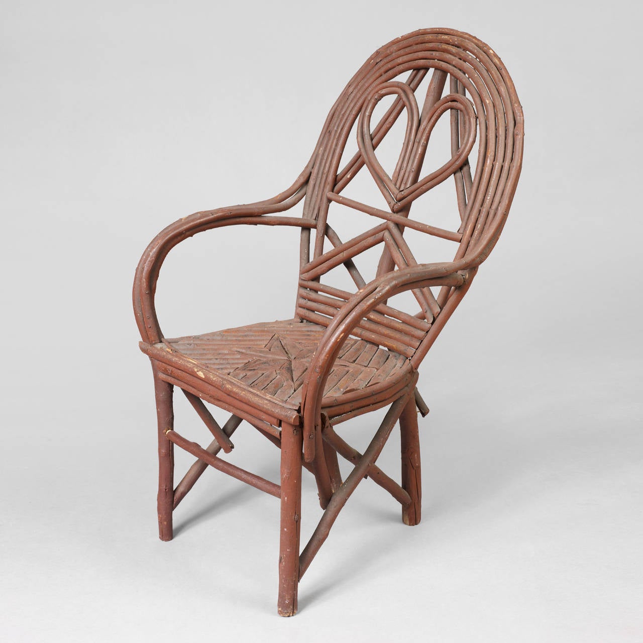 New York, probably Adirondack region, 1870-1890.
Bentwood saplings, probably ash or maple.
Excellent condition, retaining original red paint finish.
Rustic bentwood furniture was more commonly found in the Adirondack region, although it was made