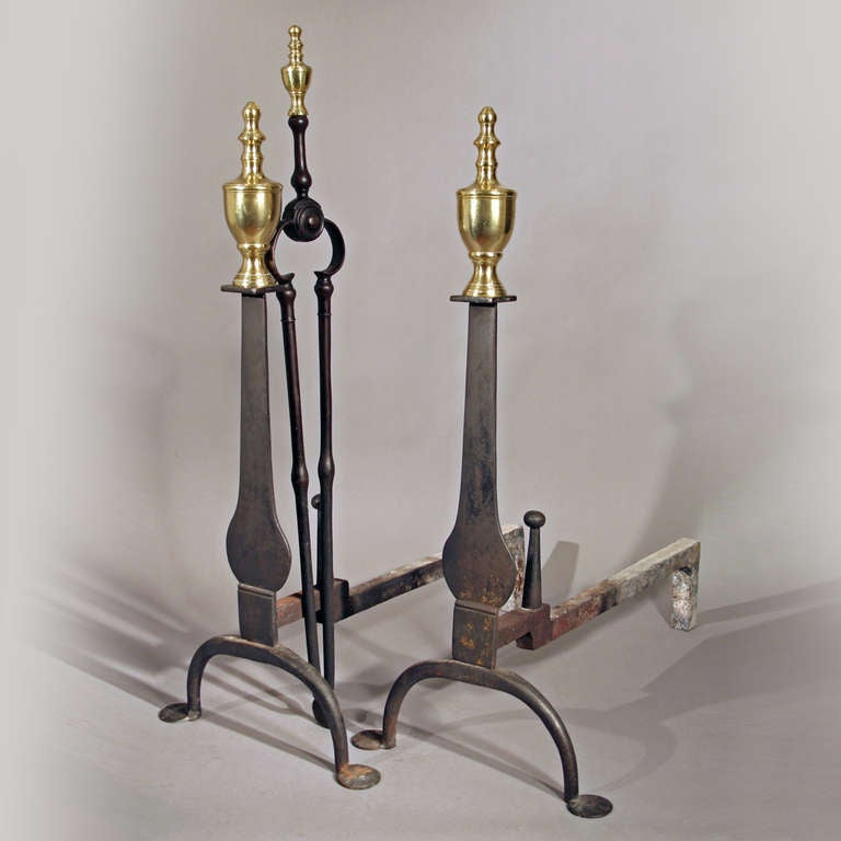New England, ca. 1750-1775.
Wrought steel and iron, brass urn top finials
Excellent condition