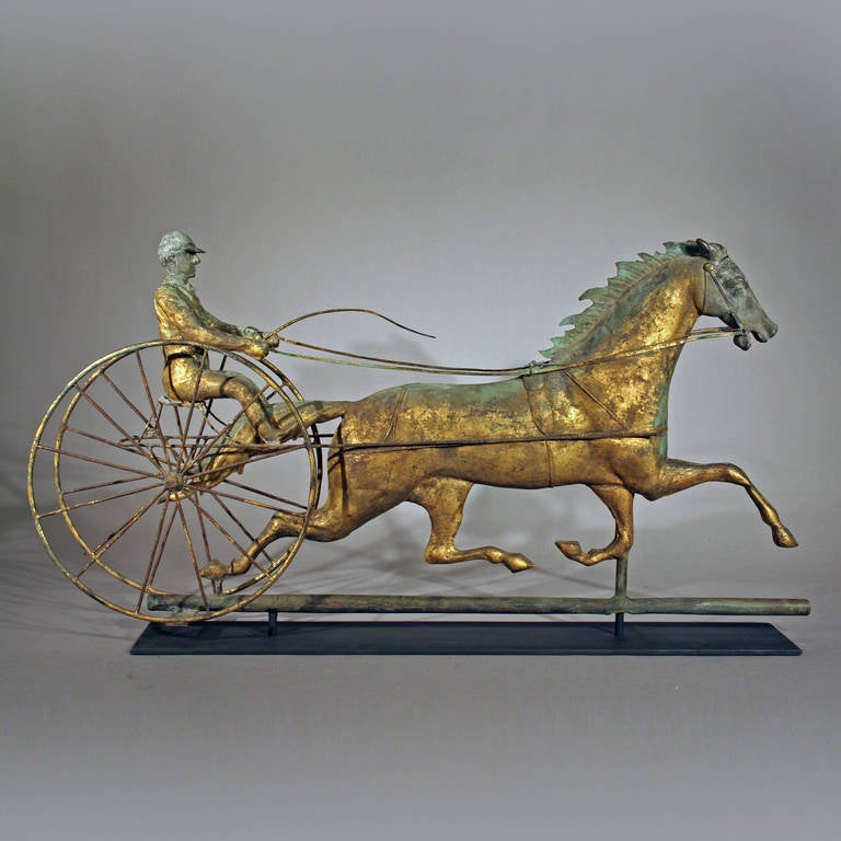 Probably by Cushing and White, Waltham, Massachusetts.
circa 1880-1890.
Full body copper, copper tubing, cast zinc horses head and riders head, iron.
Condition: The weathervane itself is in excellent condition, gilt surface is old but not