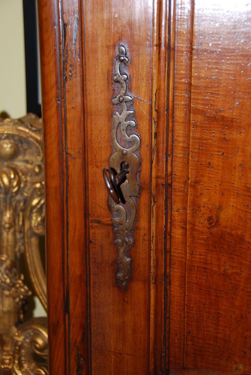 A Louis XV Walnut Bonnetiere