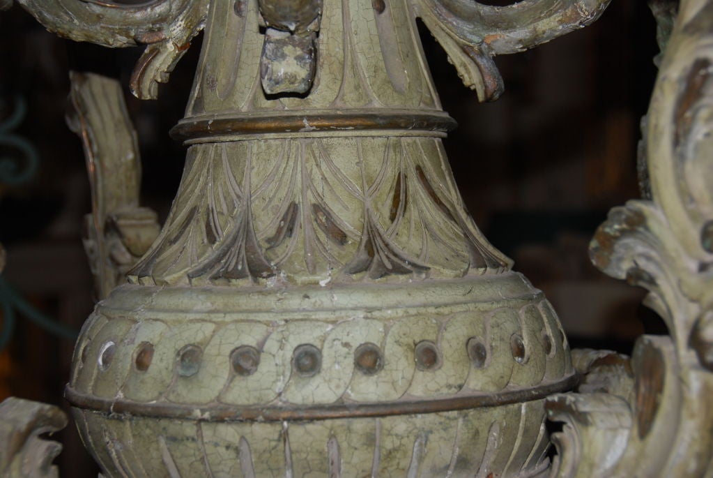 Carved and Painted Wood Eight Arm Chandelier