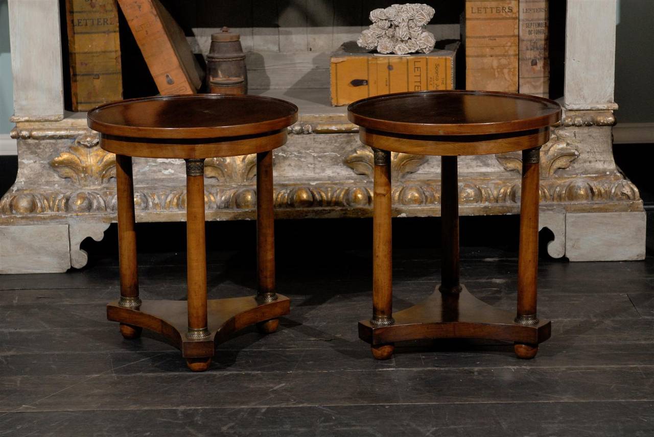 A Pair of French Empire Style Mahogany Round Side Tables