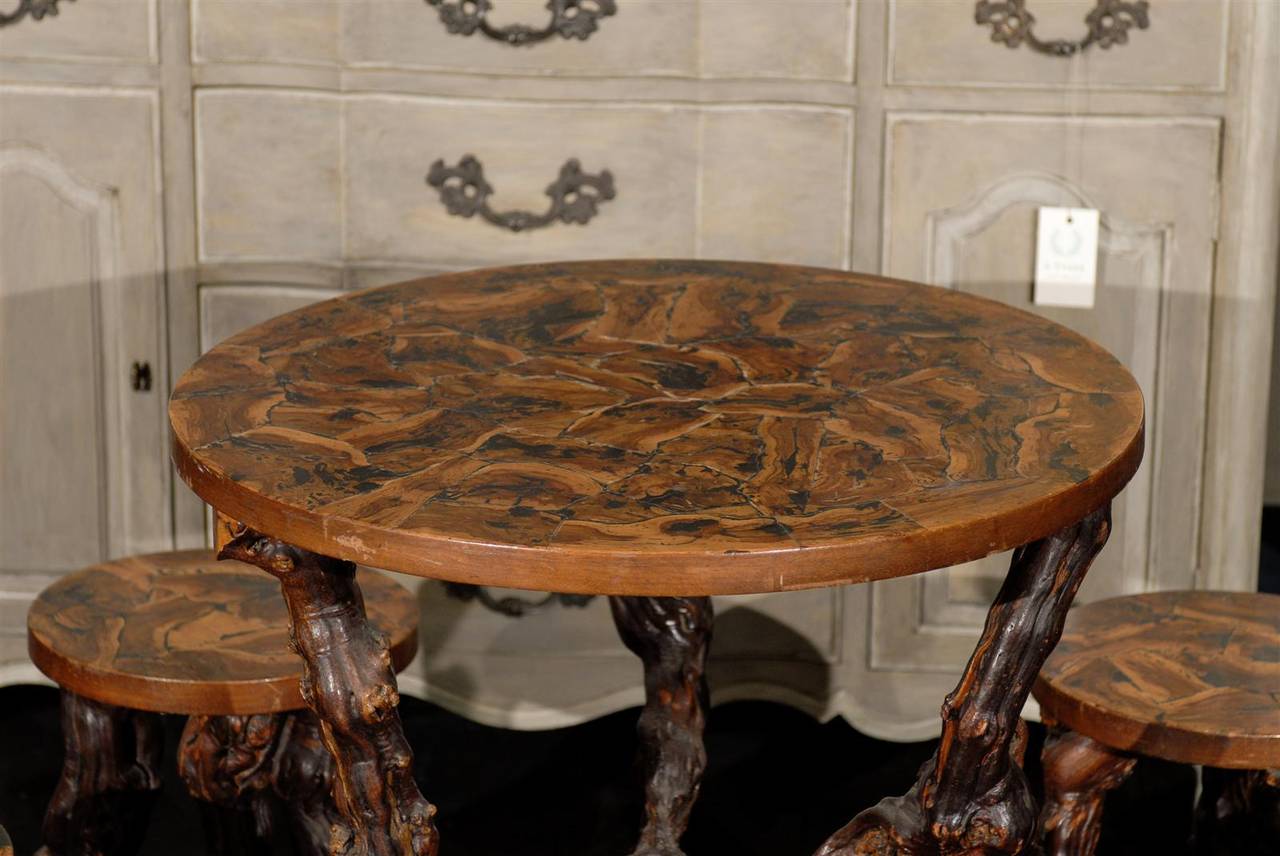 Set of European Grapevine Round Table and Four Accompanying Stools 1