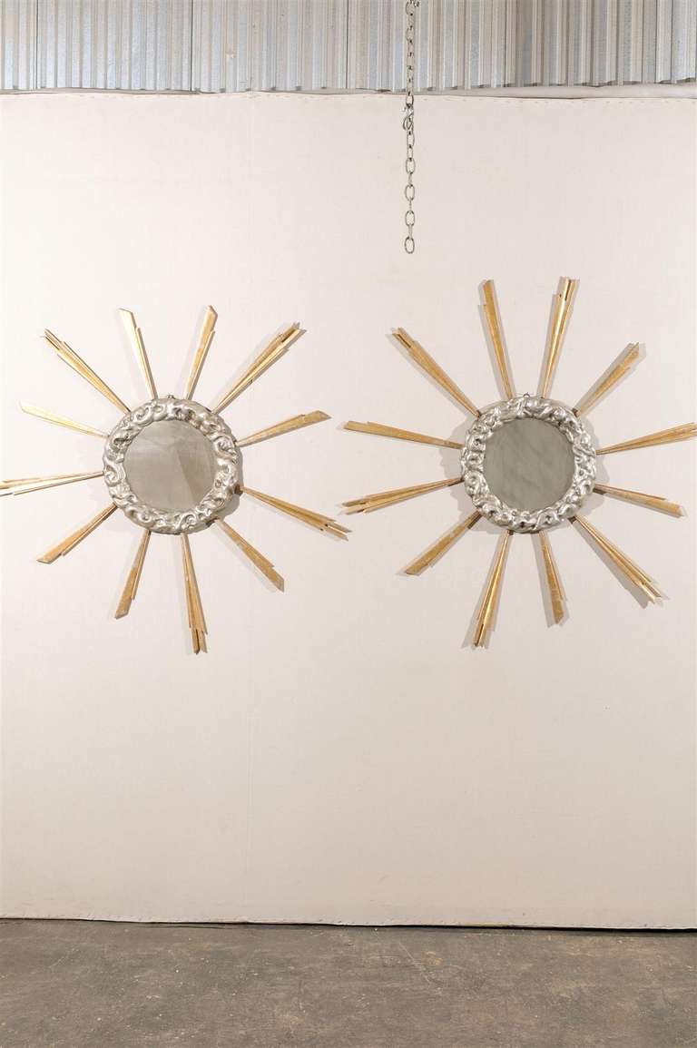 An Italian mid-19th century gilded cloudy sunburst mirror with new glass. Delicate sun rays.

We have a pair available, they are priced and sold separately. The price below is for each.