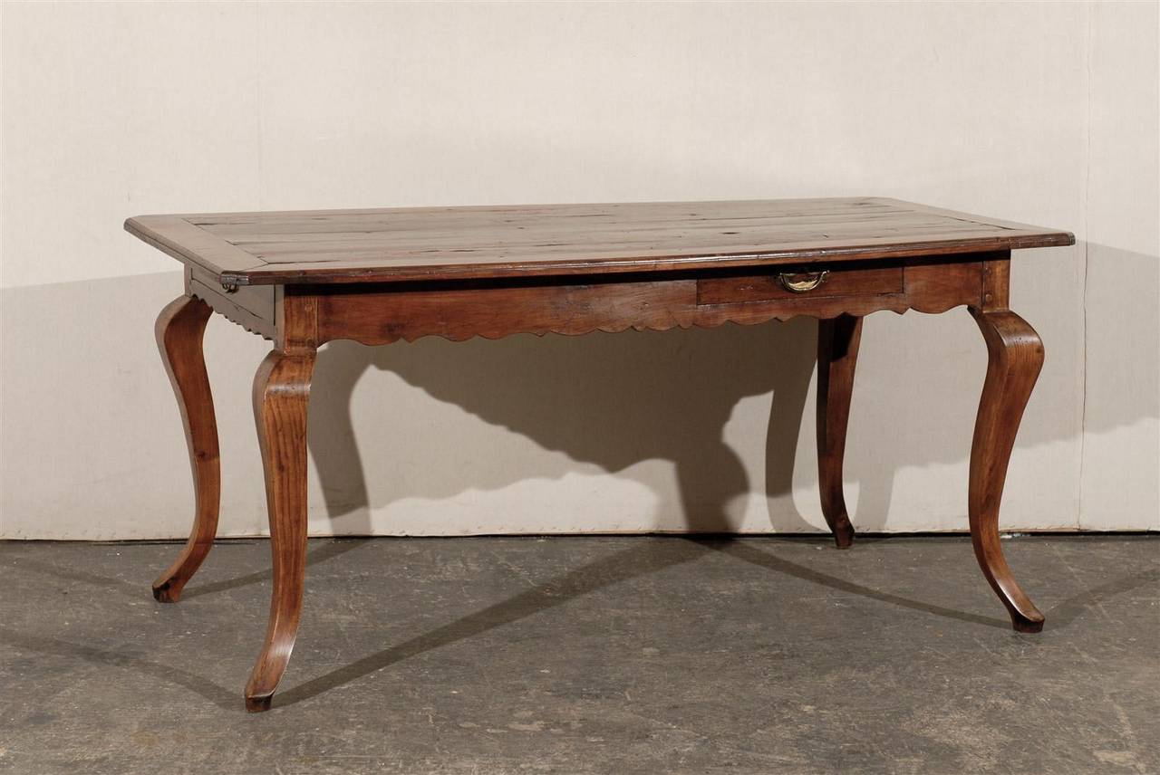A Late 18th century French Fruitwood Two-Drawer Desk or Table with Cabriole Legs and Nicely Scalloped Apron.