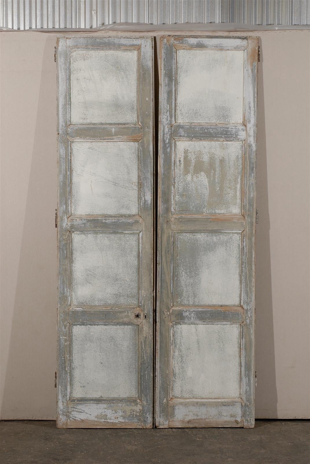 A Pair of French 19th Century Painted Wood Doors of Lovely Light Blue-Green Color. 

Please Look at Images 8, 9 and 10 to see the other side with the hardware.