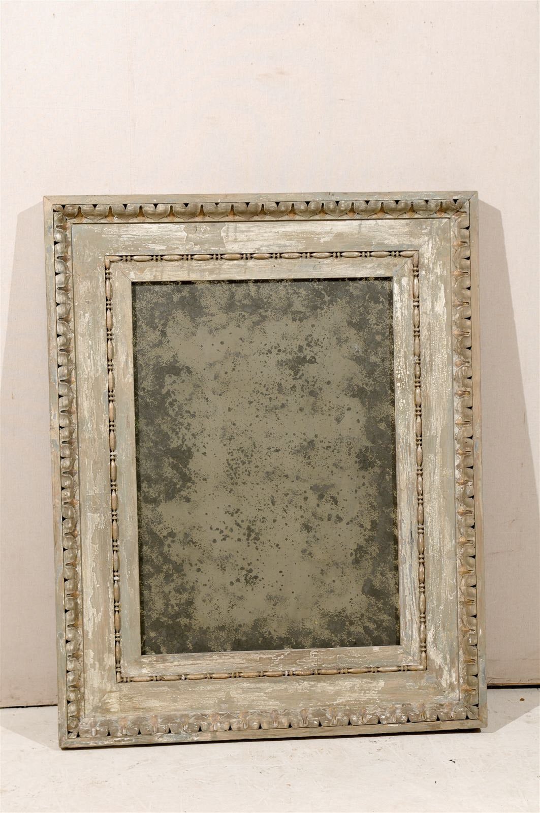 An Italian Early 19th Century Wood Carved Mirror with Richly Carved Molding (Including the 