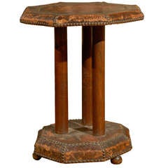 An Italian Distressed Leather Clad Accent Table with Nailheads