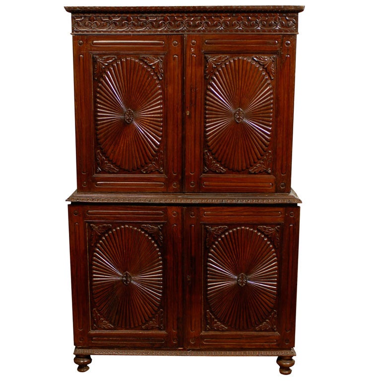 A 19th Century British Colonial Cabinet with Oval Patterns