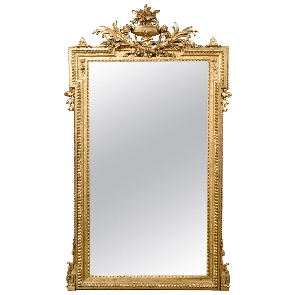 A French 19th Century Gilded Rectangular Mirror Wit Carved Crest