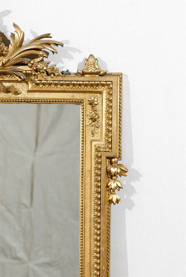A French 19th Century Gilded Rectangular Mirror Wit Carved Crest 1