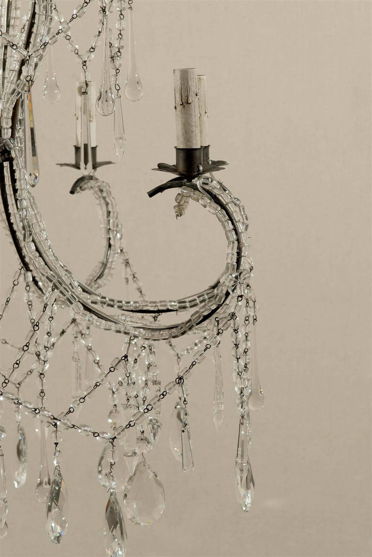 Italienischer achtflammiger Kristall-Kronleuchter mit eleganter Wasserfallplatte aus Kristall  im Angebot 2