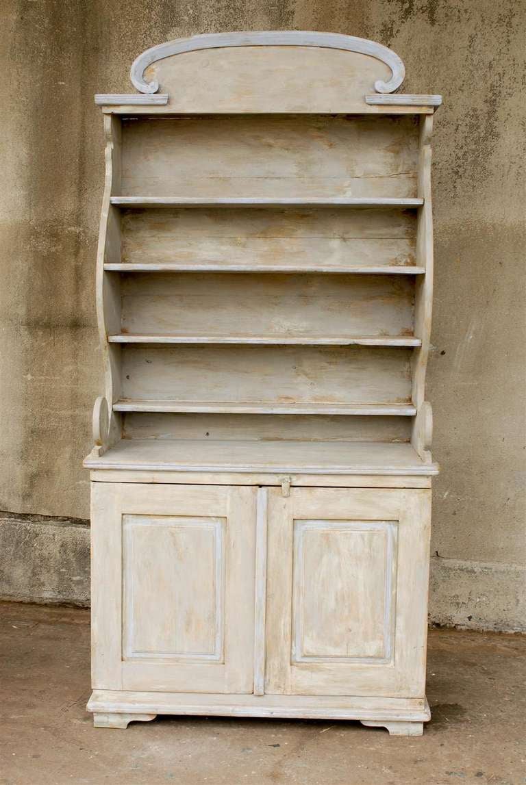 A European Painted Wood Bookshelf With Opened Shelves Over Two Doors at