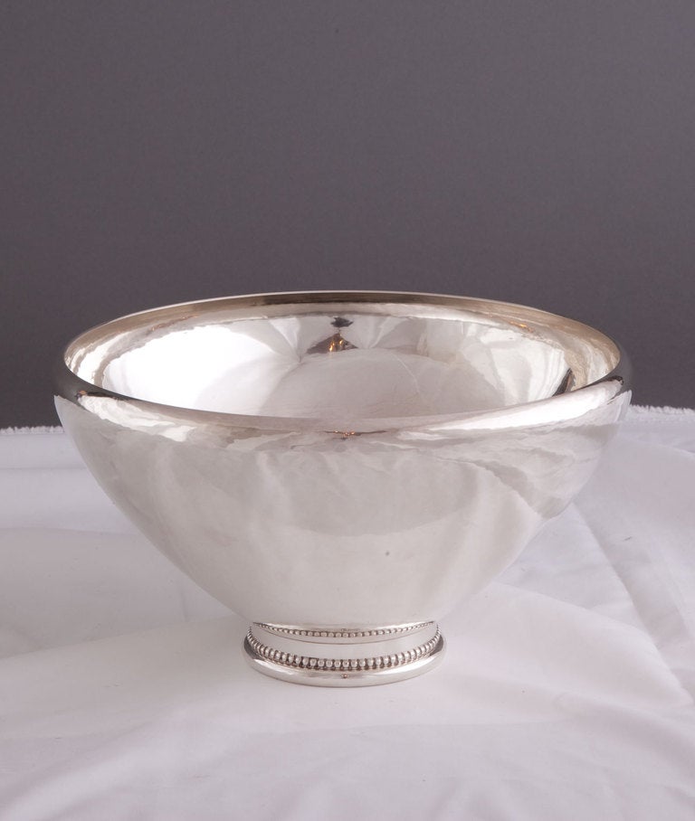 Very Fine post 1945, No. 461 A Bowl, by Georg Jensen, flared circular shaped top hand hammered with slightly inverted rim resting on circular beaded pedestal foot. 17.120 troy ounces.