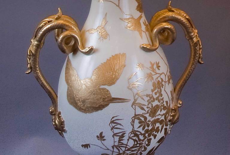 Gorgeous pair of Porcelain Lamps, possibly Royal Worcester, parcel-gilt with birds, florals and snakes, originally vases later converted to lamps.