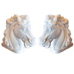 A Pair of Life-Size Carved Marble Horse Heads