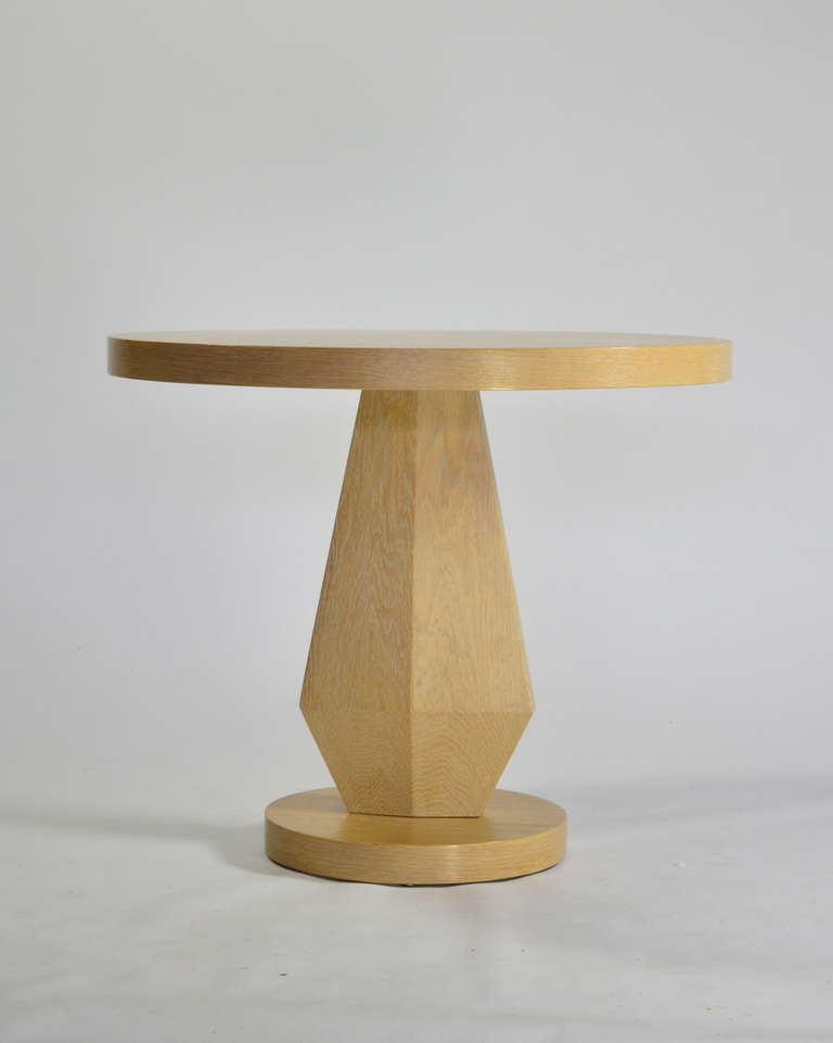 This handsome oak cocktail table table by Karpen Furniture features a beautiful faceted pedestal base, ample surface area, and an elegant cerused finish. A striking and unusual design by a quality mid century California company.

Please feel free