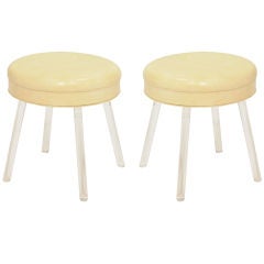 A Pair of Lucite Swivel Stools