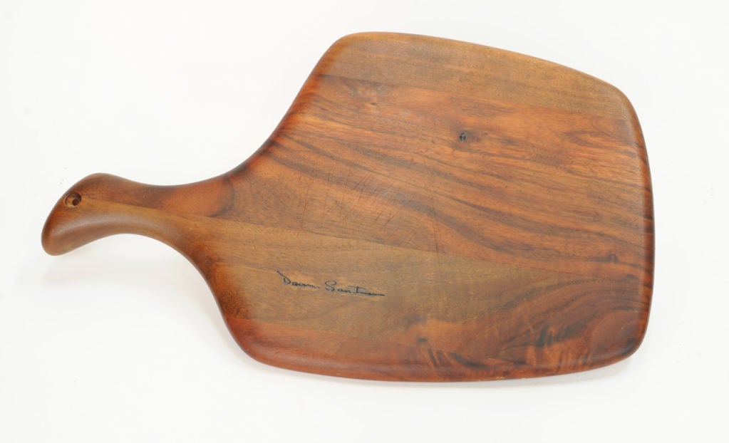 A wonderfully grained and shaped cutting board by California woodworking artist Dean Santner
