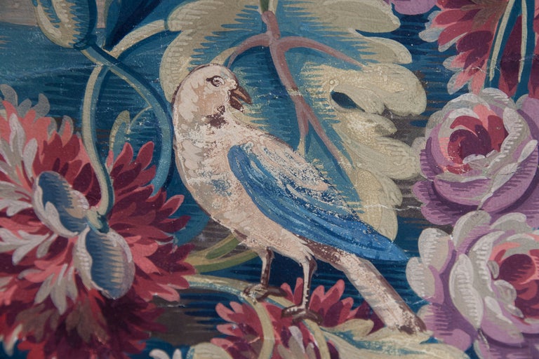 Tapestry cartoon for the tapestry that would have been used on a sofa seat. With a distant view of a chateau surrounded by poppies and roses with birds and a rabbit. In the style of the early 18th century. Painted in gouache on paper and backed with