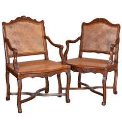A Pair Of Mid 18th Century Louis XV Caned Walnut Armchairs
