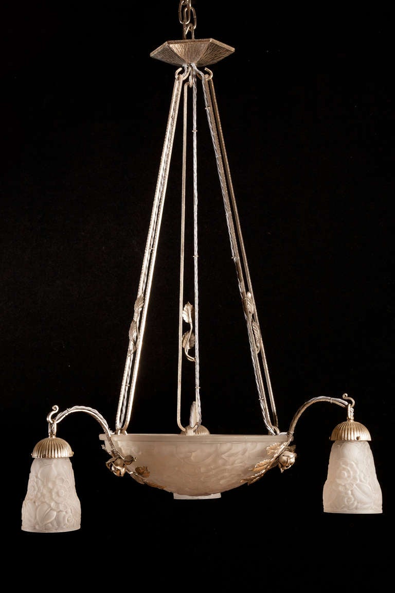 Three arm silver plate and moulded glass chandelier, re-silver plated. With central glass dish and three glass tulips on silver plated arms, decorated with silver roses and leaves with climbing leaves up the arms. Presently re-wired for the