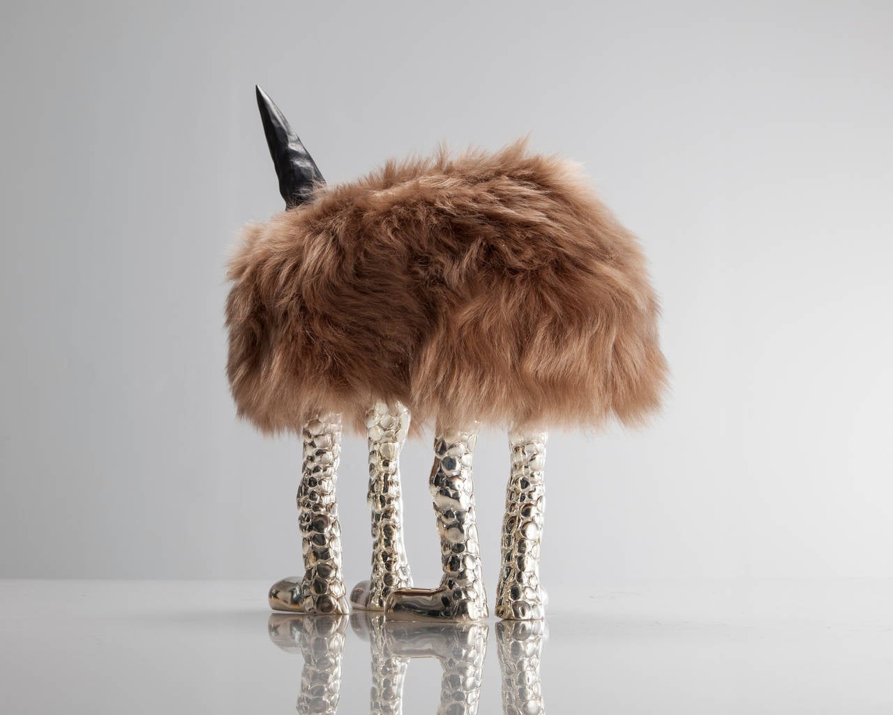 SM5688.

Unique Queef Richards mini beast in tan goat fur with Chester Cheetah feet in silver plated bronze and carved ebony horns. Designed and made by The Haas Brothers, Los Angeles, CA, 2015.