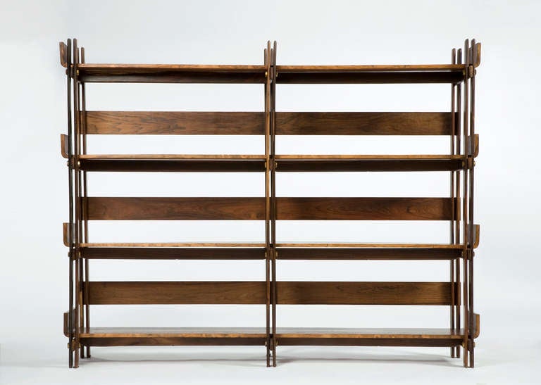 Bookshelf in rosewood with solid rosewood frame and brass trim. Brazil, 1960s.