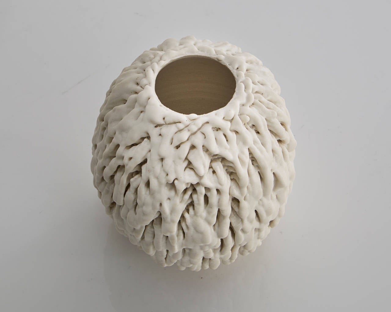 SM5644.

Unique, hand-thrown melted Urchin Accretion vase with porcelain slip in white star glaze. Designed and made by The Haas Brothers, Los Angeles, CA, 2014.