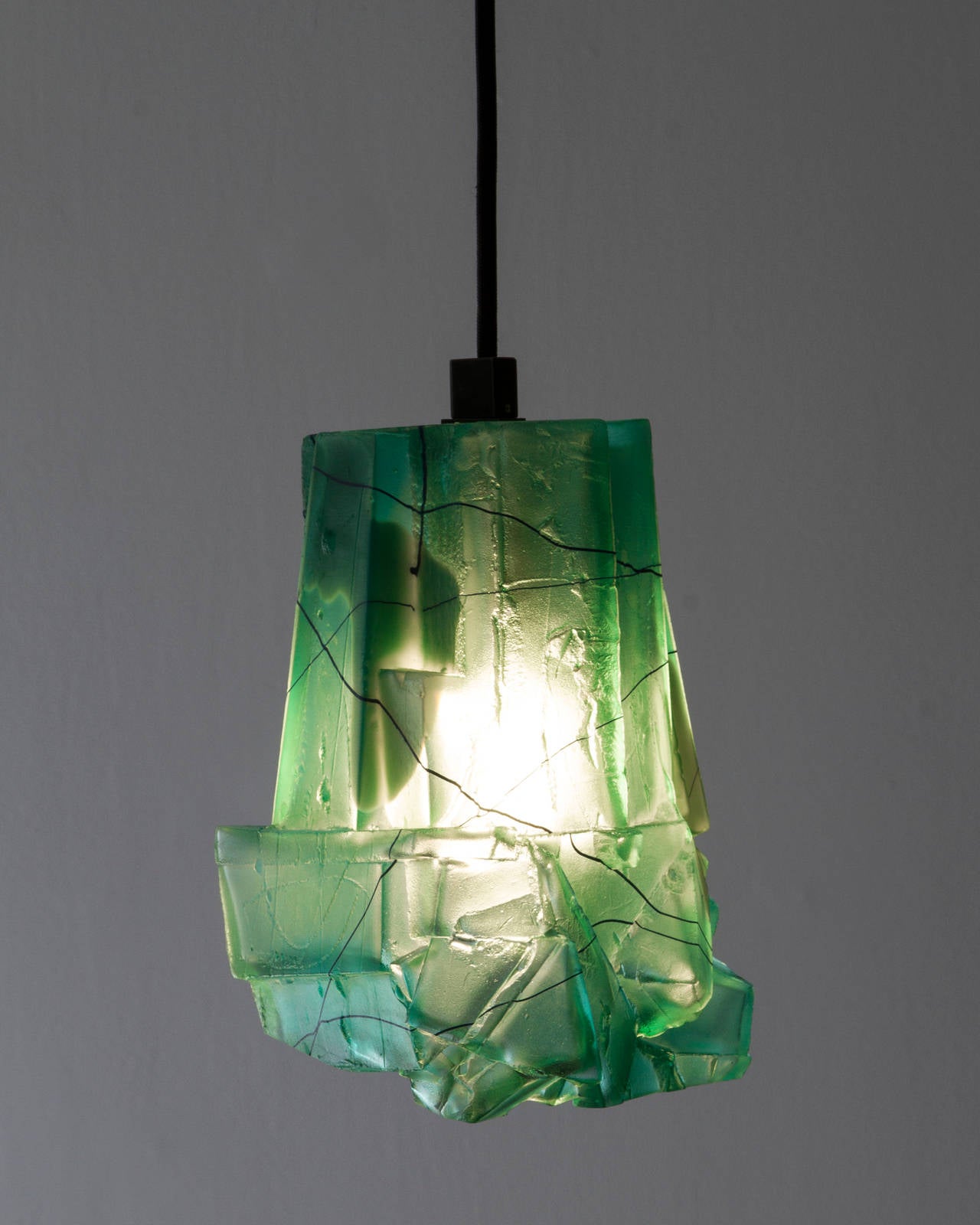 Unique Assemblage pendant lamp in teal hand-blown, cut and polished glass. Designed and made by Thaddeus Wolfe, USA, 2014.