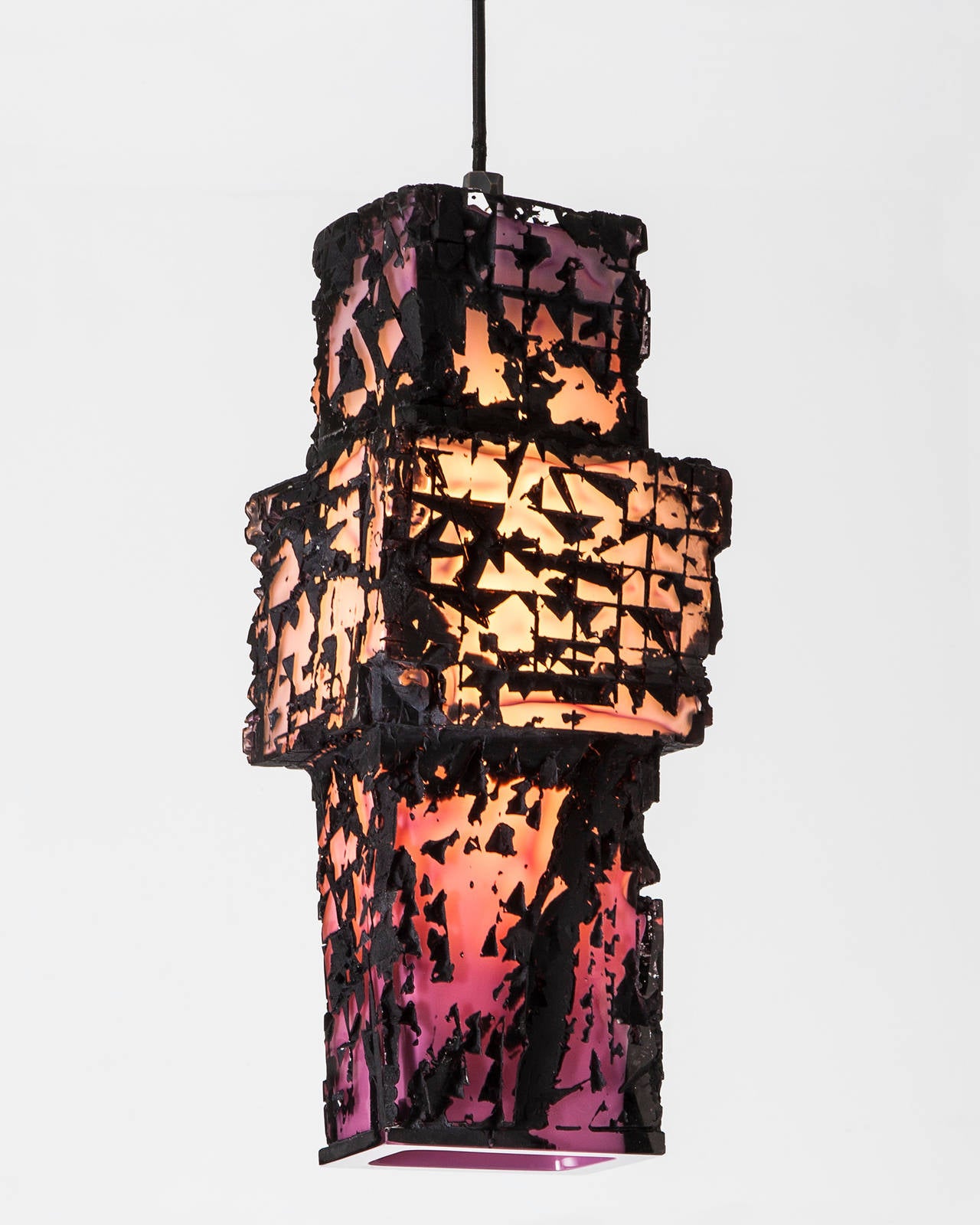 HL1396.

Unique Facet Assemblage pendant lamp in black and opal rose colored handblown, cut and polished glass. Designed and made by Thaddeus Wolfe, USA, 2013.