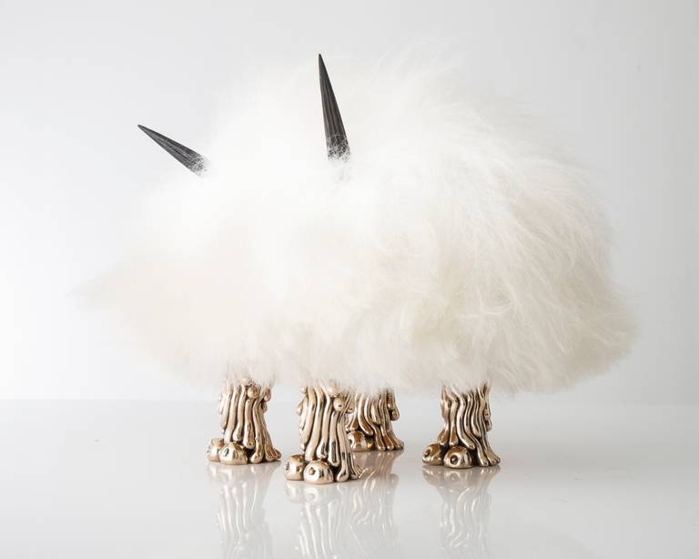 SM5197

Unique Stuffy Mini Beast in white Icelandic sheepskin with mini coyote feet in bronze. 

Designed and made by the Haas Brothers, Los Angeles, CA, 2014.