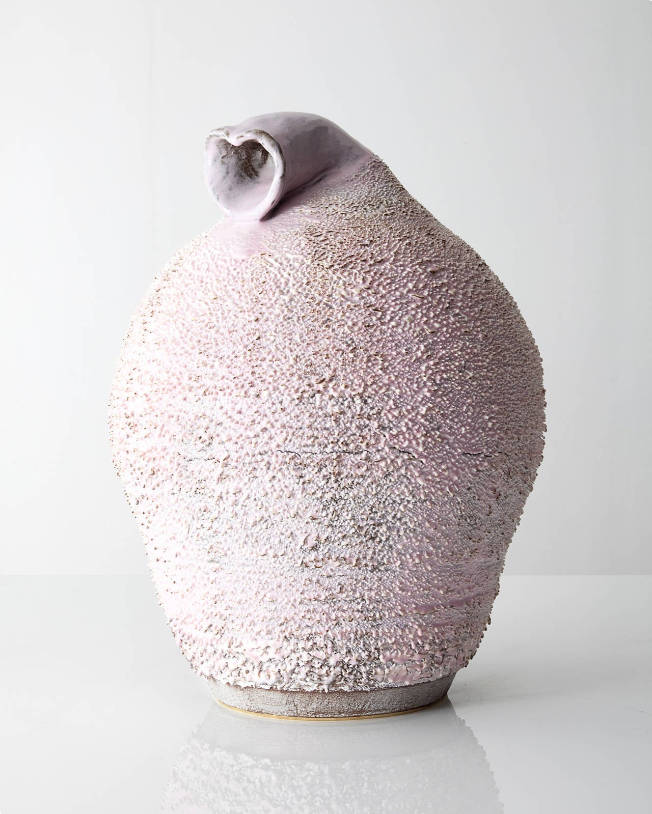 SM4675

Unique, hand-thrown Large Marge Dong On Stomach Accretion vase with porcelain slip in Angelyne glaze. Designed and made by the Haas Brothers, Los Angeles, CA, 2013.