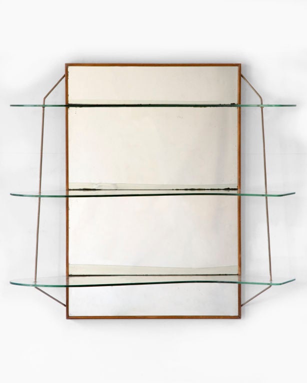 Wall-mounted shelving unit by Joaquim Tenreiro