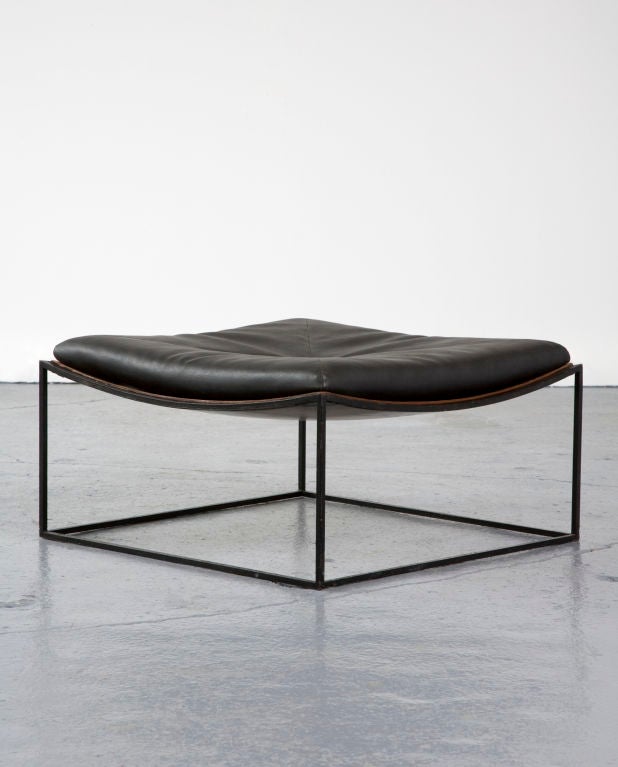 Stool in black leather with iron legs. Designed by Jorge Zalszupin for L'Atelier, Brazil, circa 1960.<br />
(pair available)