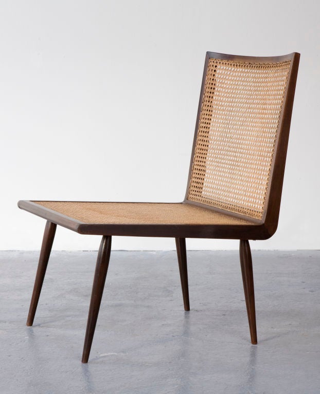 Low Bedroom Chair in jacaranda with woven cane seat and back. Designed by Joaquim Tenreiro, Brazil, circa 1960 for a private home. (seat height: 14