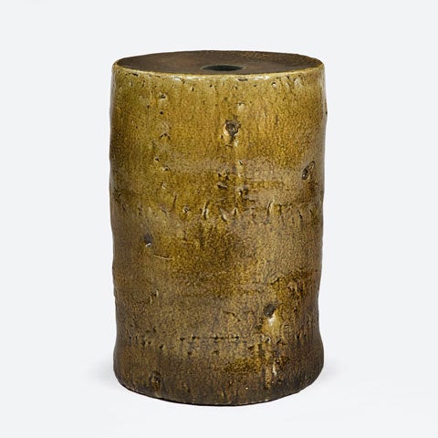 Cylindrical ceramic stool in gold glaze. Designed and made by Hun-Chung Lee, Korea, 2010.