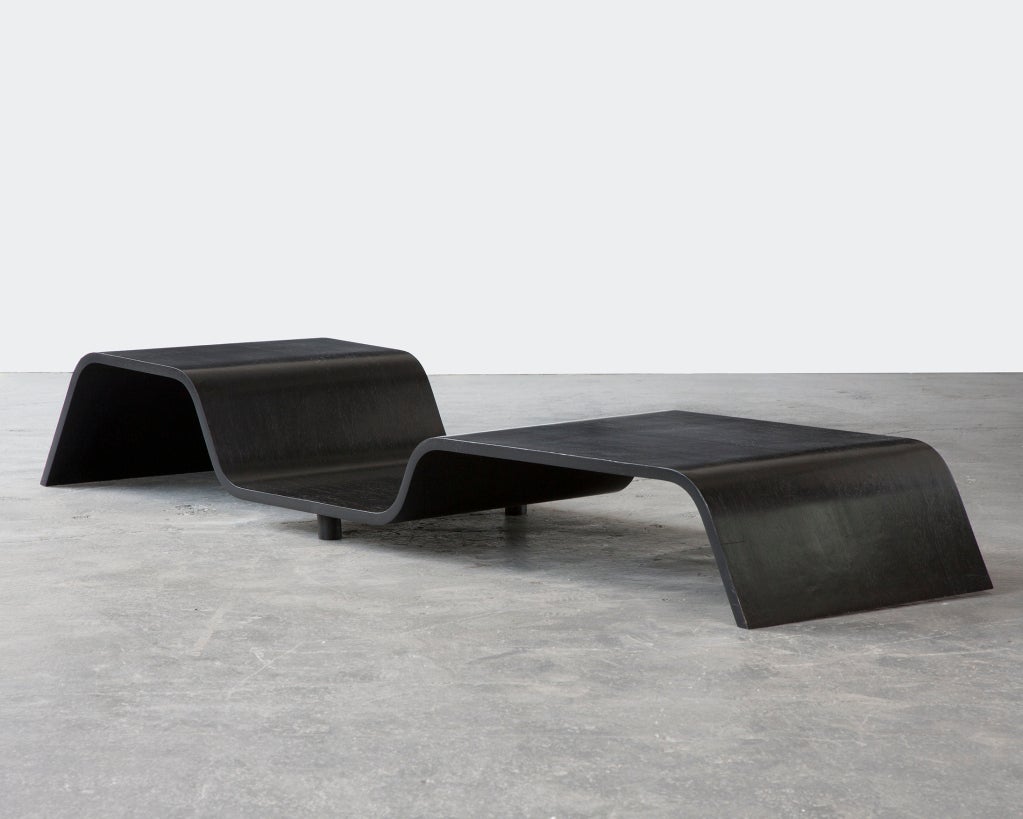 Undular coffee table in ebonized wood. Designed by Oscar Niemeyer, Brazil. Produced in Brazil, 2008.