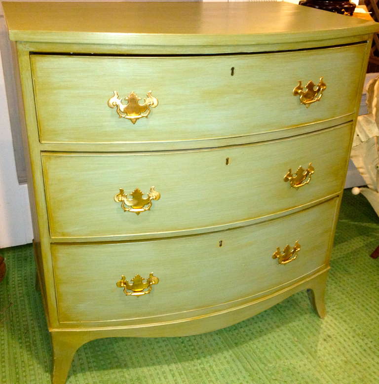 English 19th century Hepplewhite mahogany bow front chest of drawers painted green.