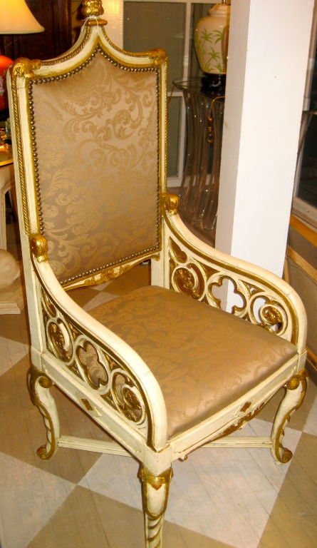 19th century Gothic Revival painted ivory white and gold armchair.